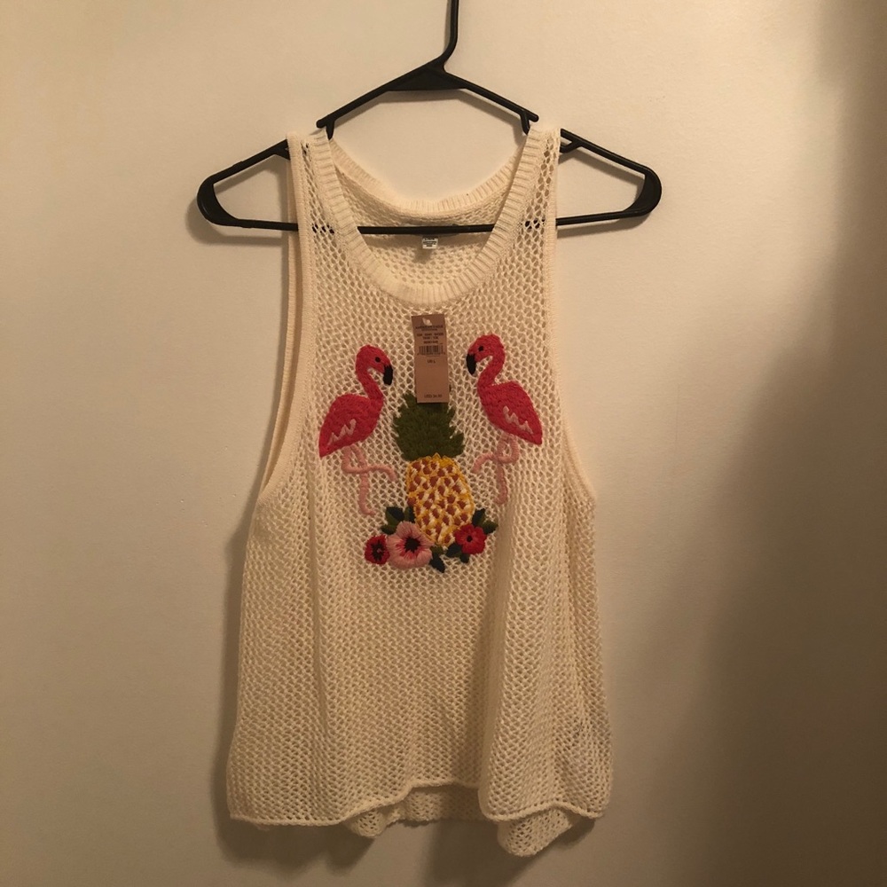 Crochet flamingo tank.